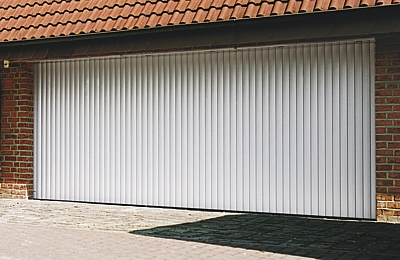 Vertico sliding garage door half open